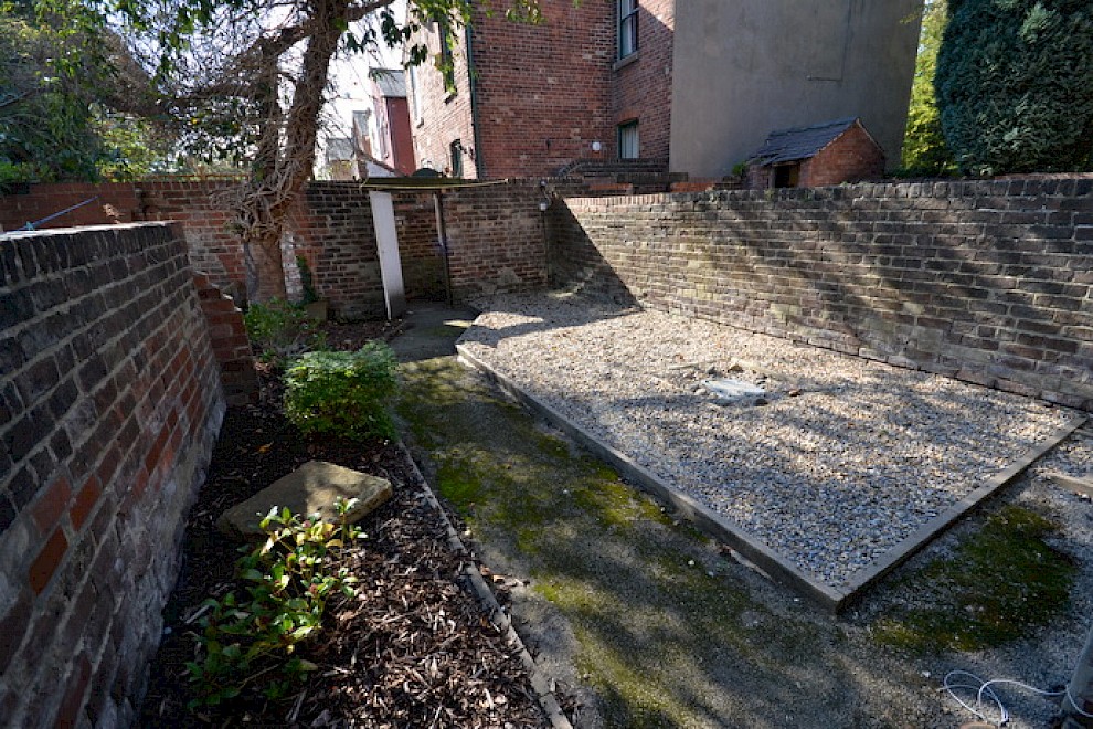 gallery image 111-broomspring-lane-rear-yard.jpg